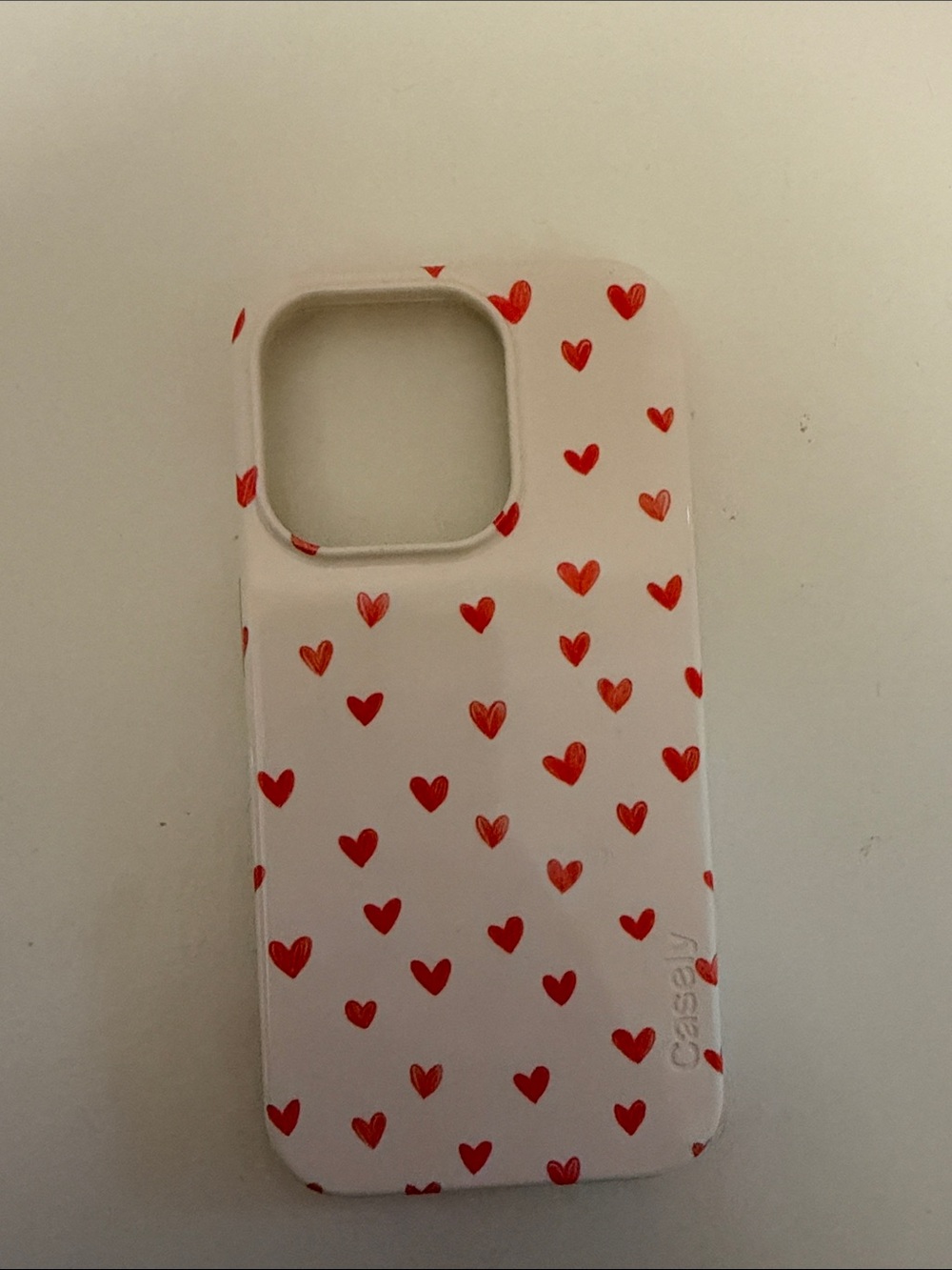 White iPhone 15 pro Case with Red Heart Pattern - Casely